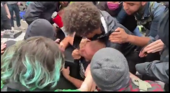 ANTIFA Shows It’s Anarchist Side By Choking A Christian Speaker In The Land Of CHAZ